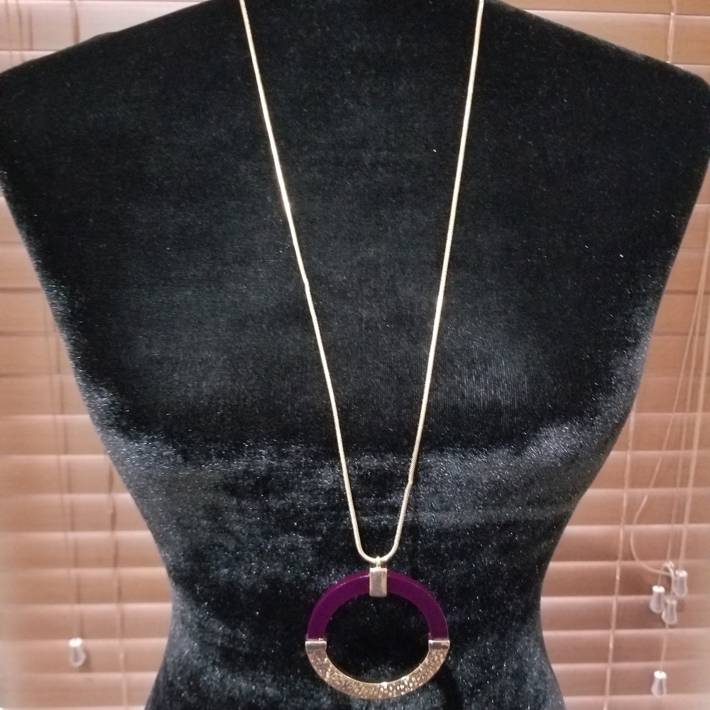 Gold necklace with purple Circle